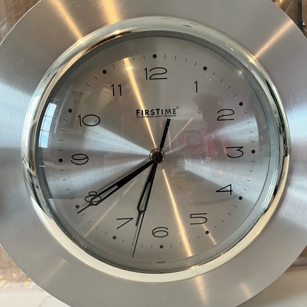 Used in good condition 12” modern wall clock